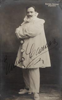 CARUSO, Enrico (1873-1921). Black and white photograph as Canio in Pagliacci , signed ("Enrico Caruso"), by Aime Dupont, n.d.