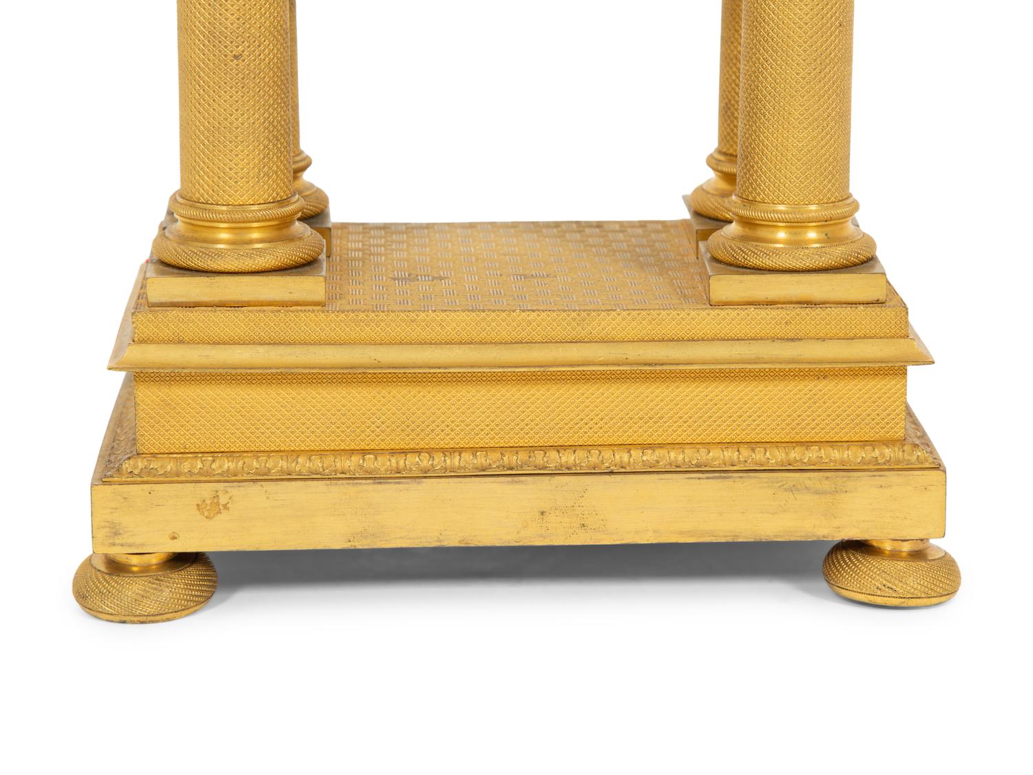 An Empire Style Gilt Bronze Portico Clock