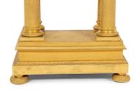 An Empire Style Gilt Bronze Portico Clock