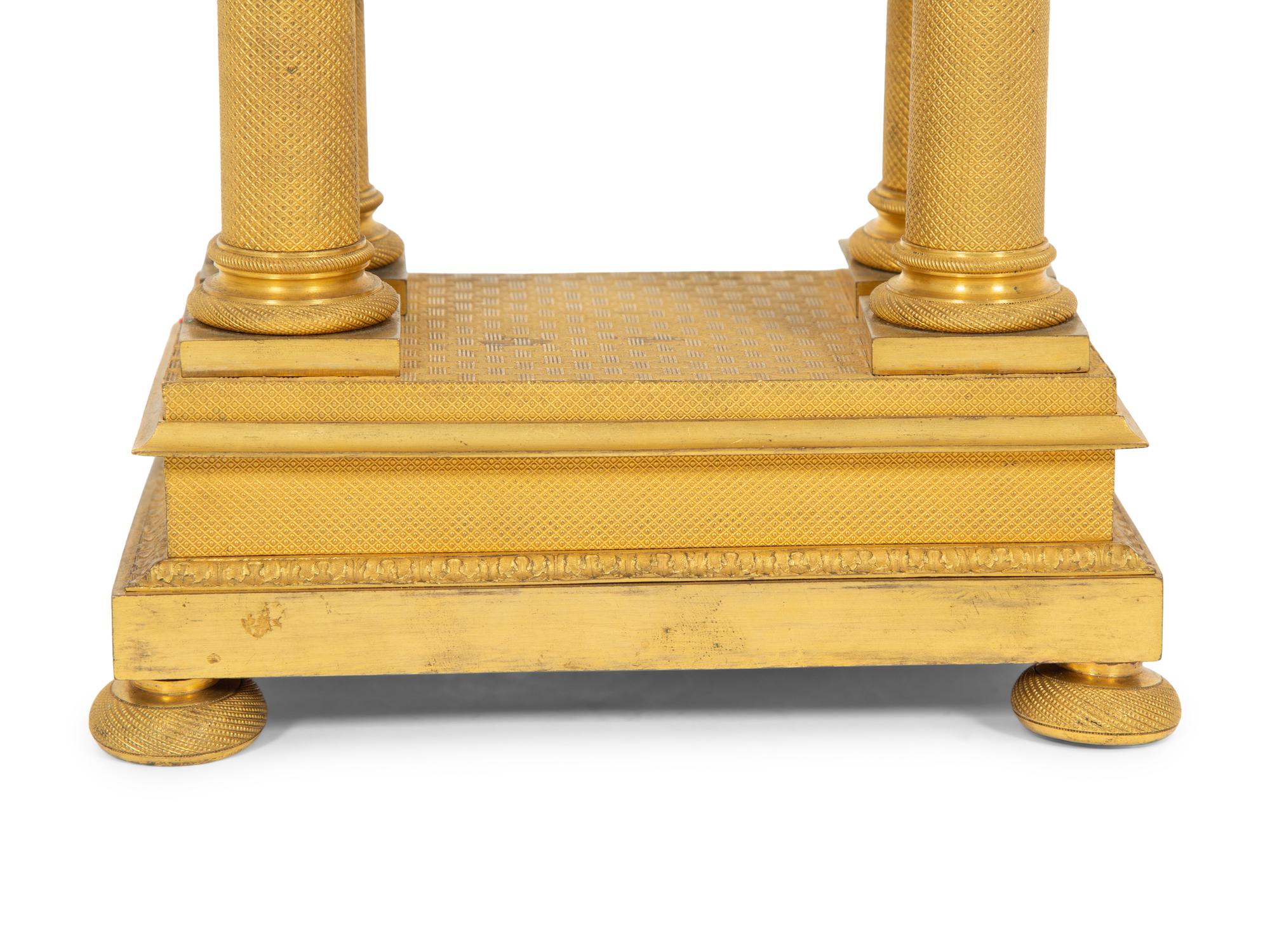An Empire Style Gilt Bronze Portico Clock