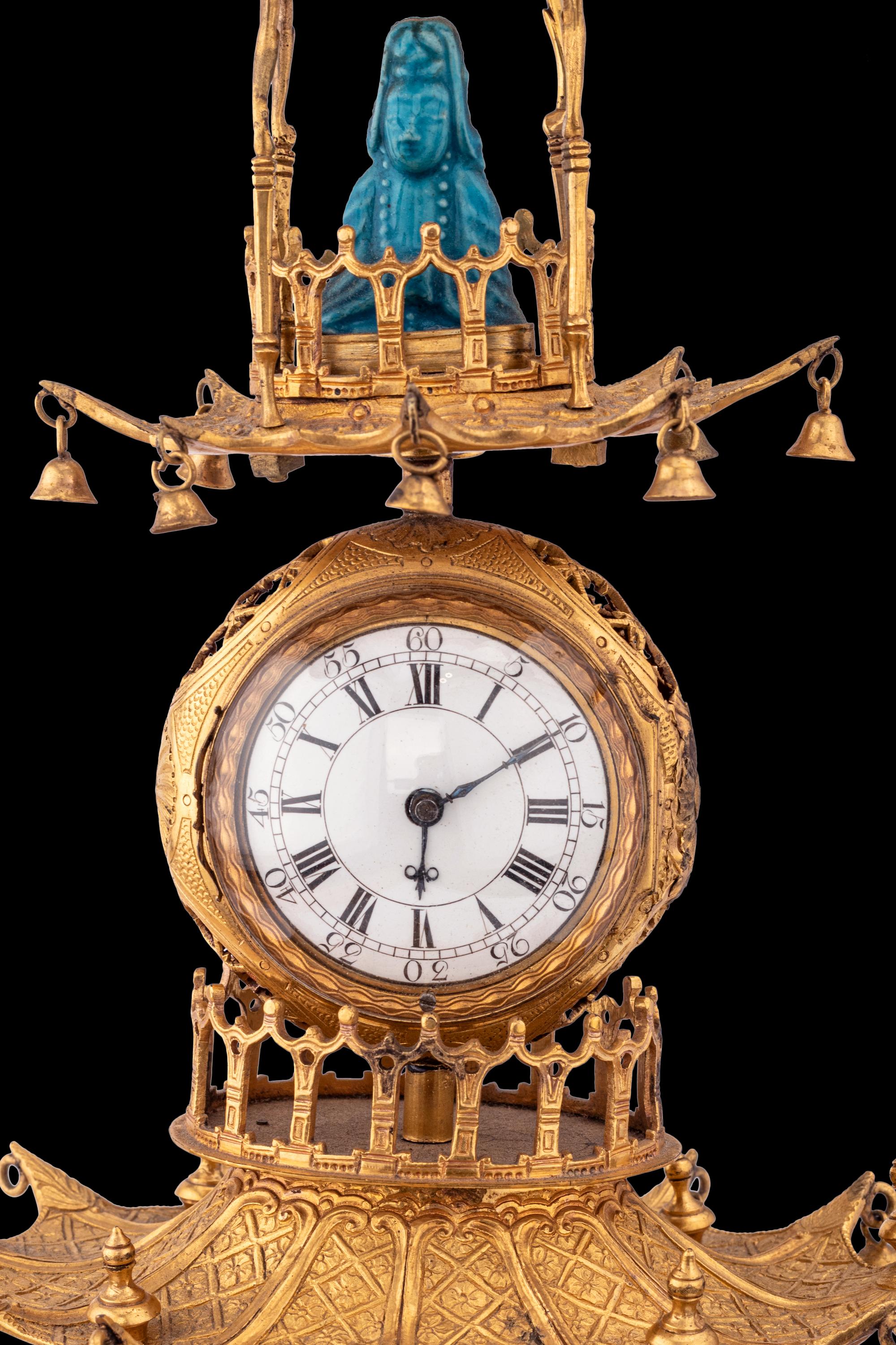 A Louis XV Style Gilt Bronze and Chinese Porcelain Mounted Pagoda-Form Mantel Clock
