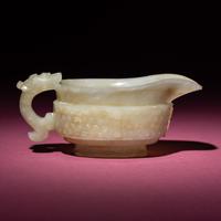 A Chinese Pale Celadon Jade Archaistic Yi Vessel, 17th Century — 清早期 青白玉仿古龍紋匜