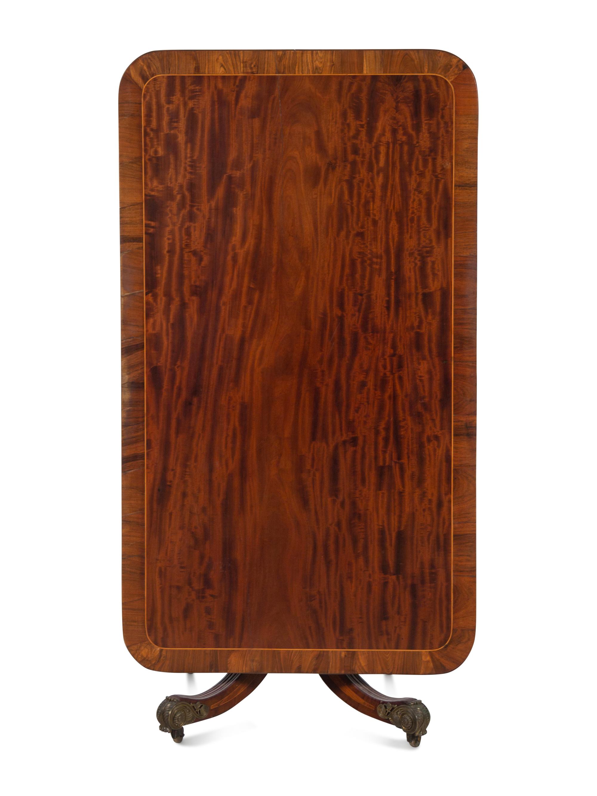 A Regency Gilt Bronze Mounted Mahogany and Rosewood Breakfast Table