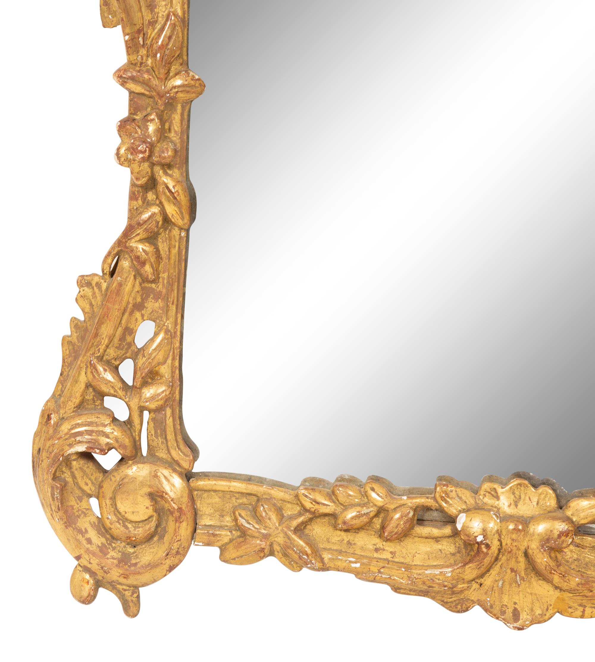 An Italian Rococo Giltwood Mirror