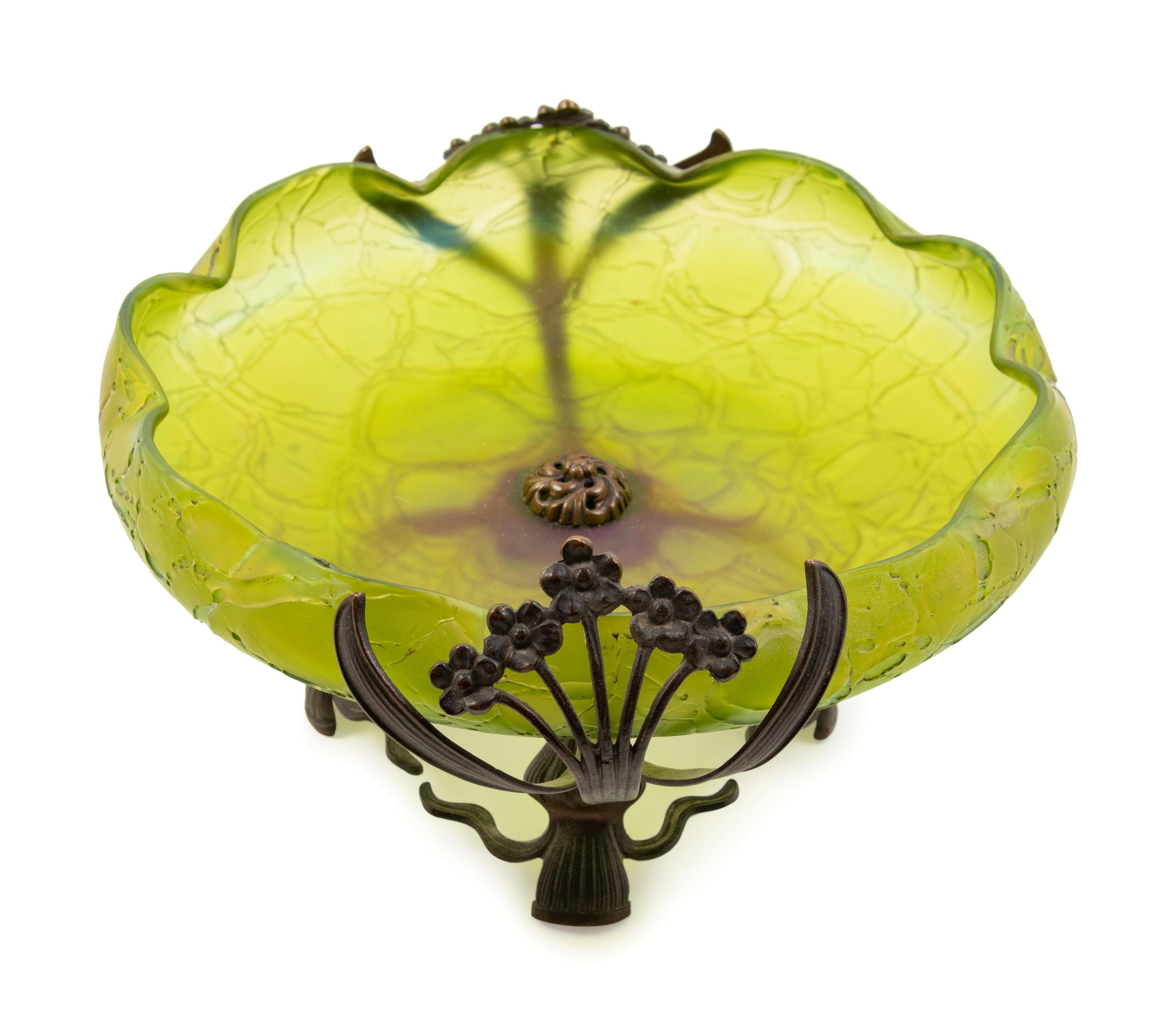 A Loetz Style Green Glass and Patinated Metal Mounted Bowl