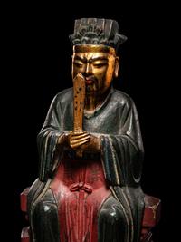 A Chinese Gilt, Red, and Black Lacquered Wood Figure of an Official
