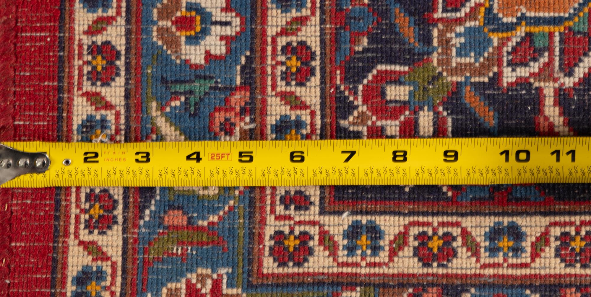 A Kashan Wool Rug
