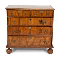 A George II Walnut Chest of Drawers