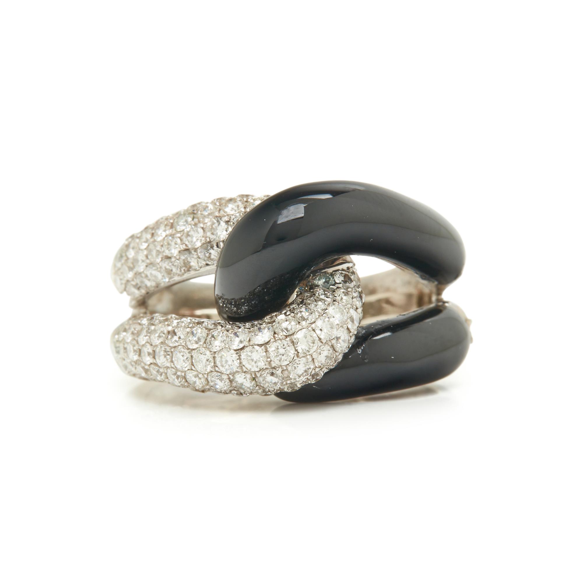 WHITE GOLD, DIAMOND AND BLACK ONYX RING