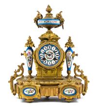 A Sevres Style Porcelain and Gilt Metal Mounted Mantel Clock, Mourey, Height 14 1/2 inches.