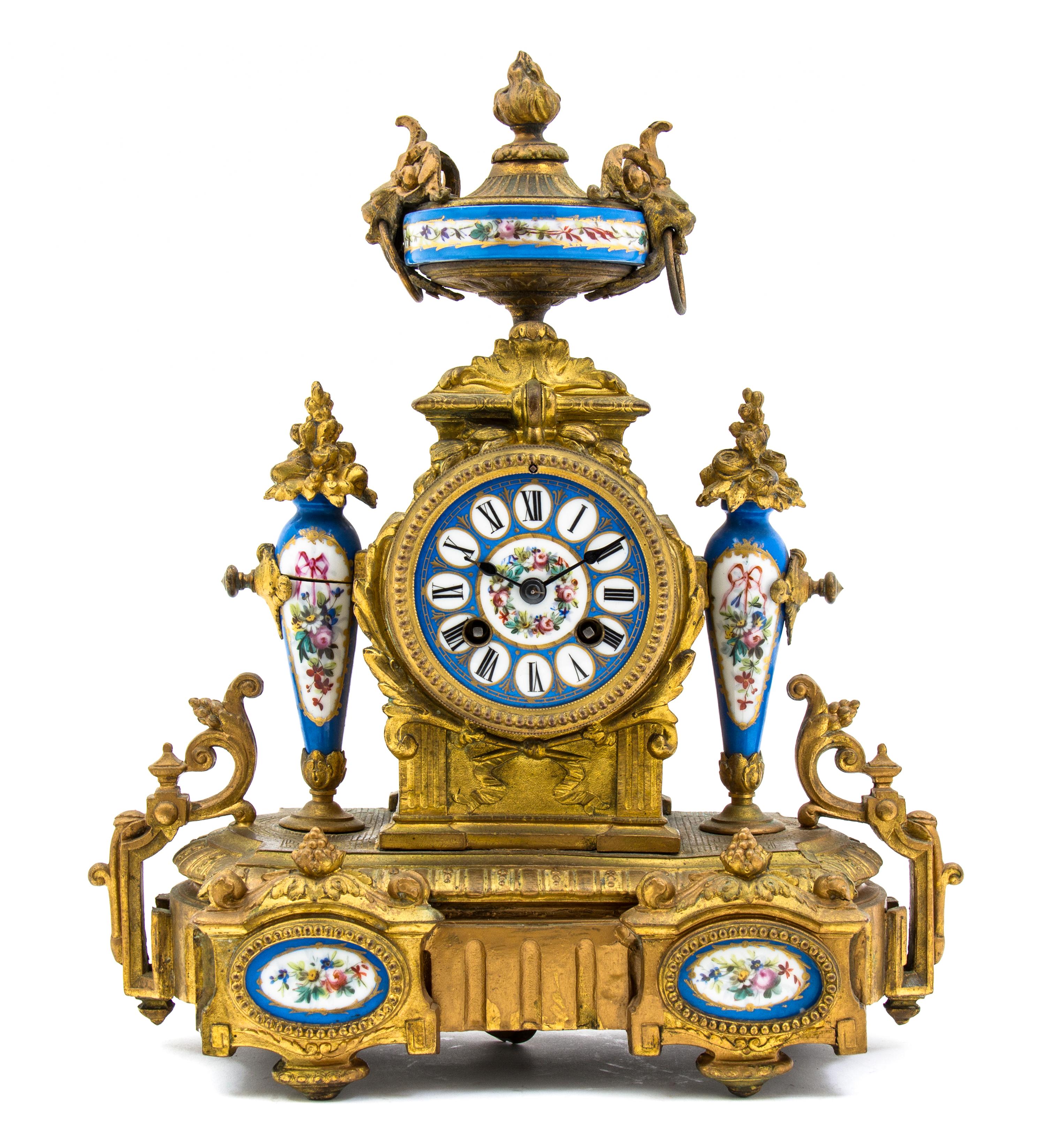 A Sevres Style Porcelain and Gilt Metal Mounted Mantel Clock, Mourey, Height 14 1/2 inches.