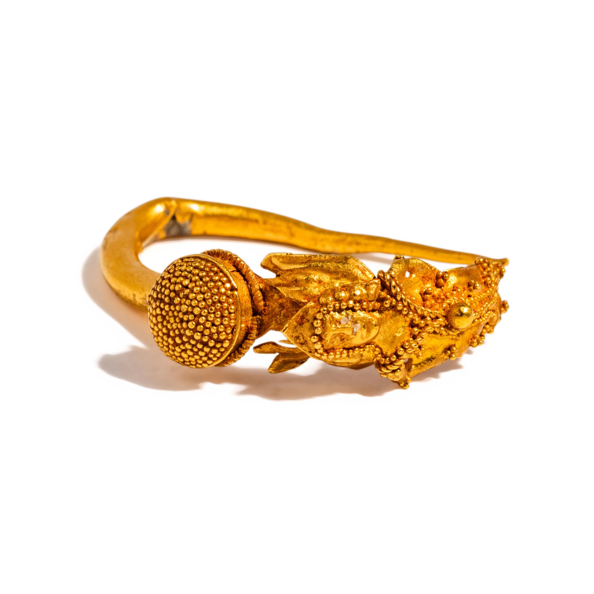 A Greek Gold Earring with Winged Eros