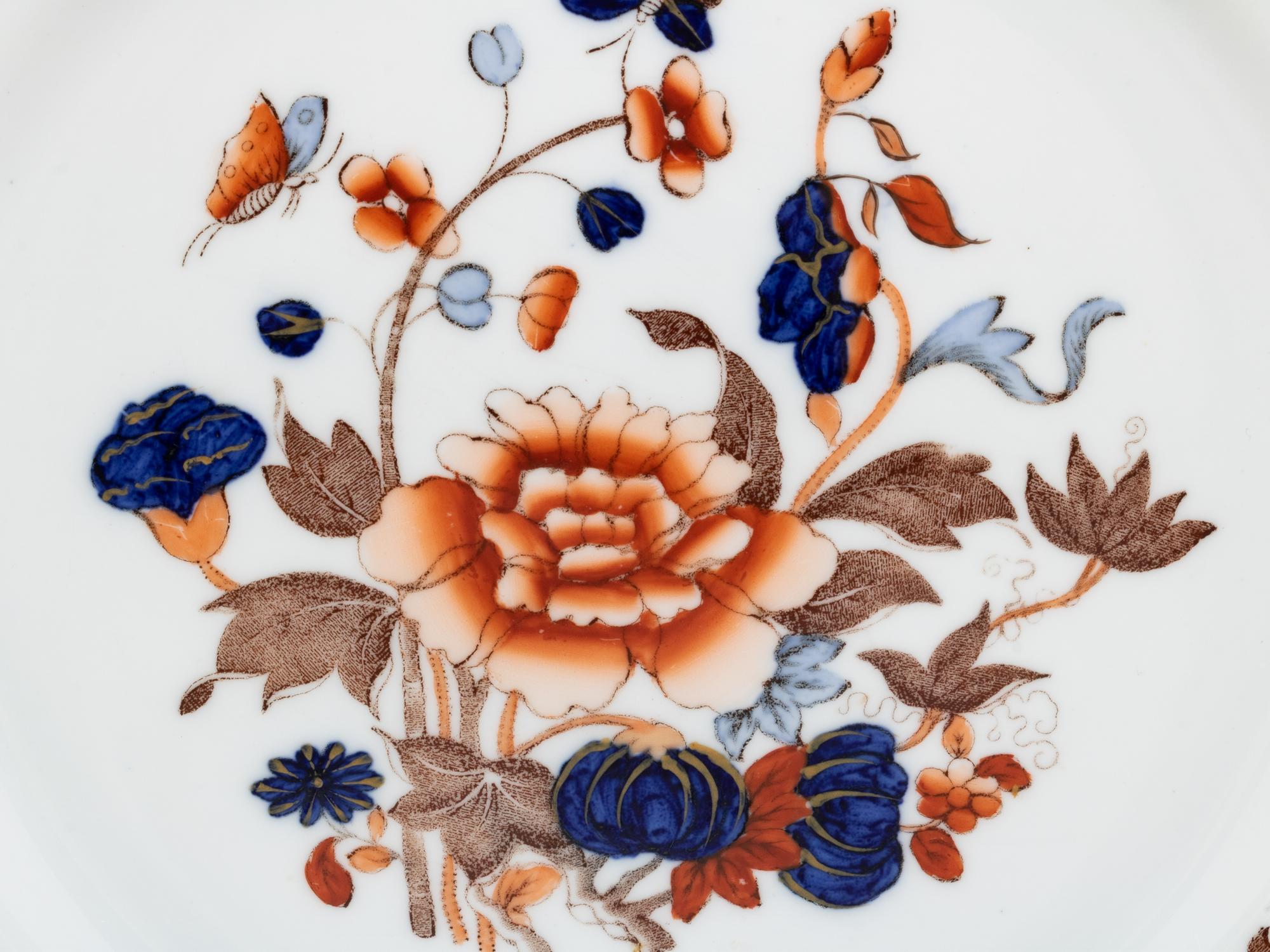 A Set of Twelve Spode Dinner Plates and a Similar Set of Royal Crown Derby Cups and Saucers