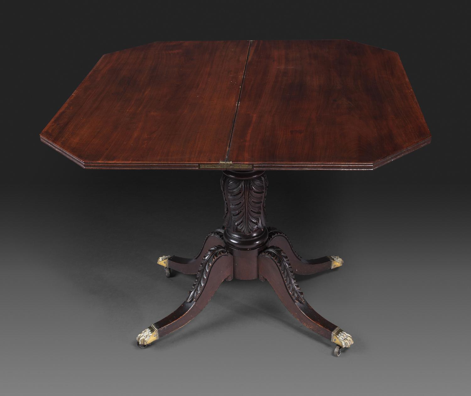 A Classical Carved and Brass Mounted Mahogany Claw-Foot Card Table