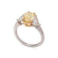 TREATED FANCY INTENSE YELLOW DIAMOND AND DIAMOND RING