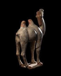 A Chinese Painted Pottery Figure of a Camel