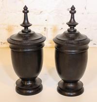 A Pair of Turned Wood Urns. Height 11 inches.