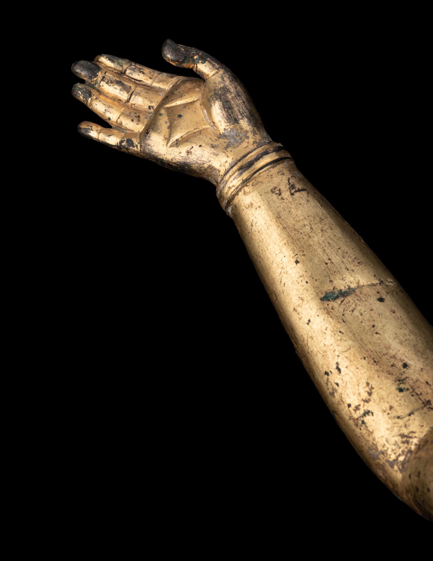 A Chinese Gilt Bronze Buddha's Arm