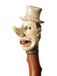 Three Carved Horn or Bone and Brass-Mounted Figural Canes