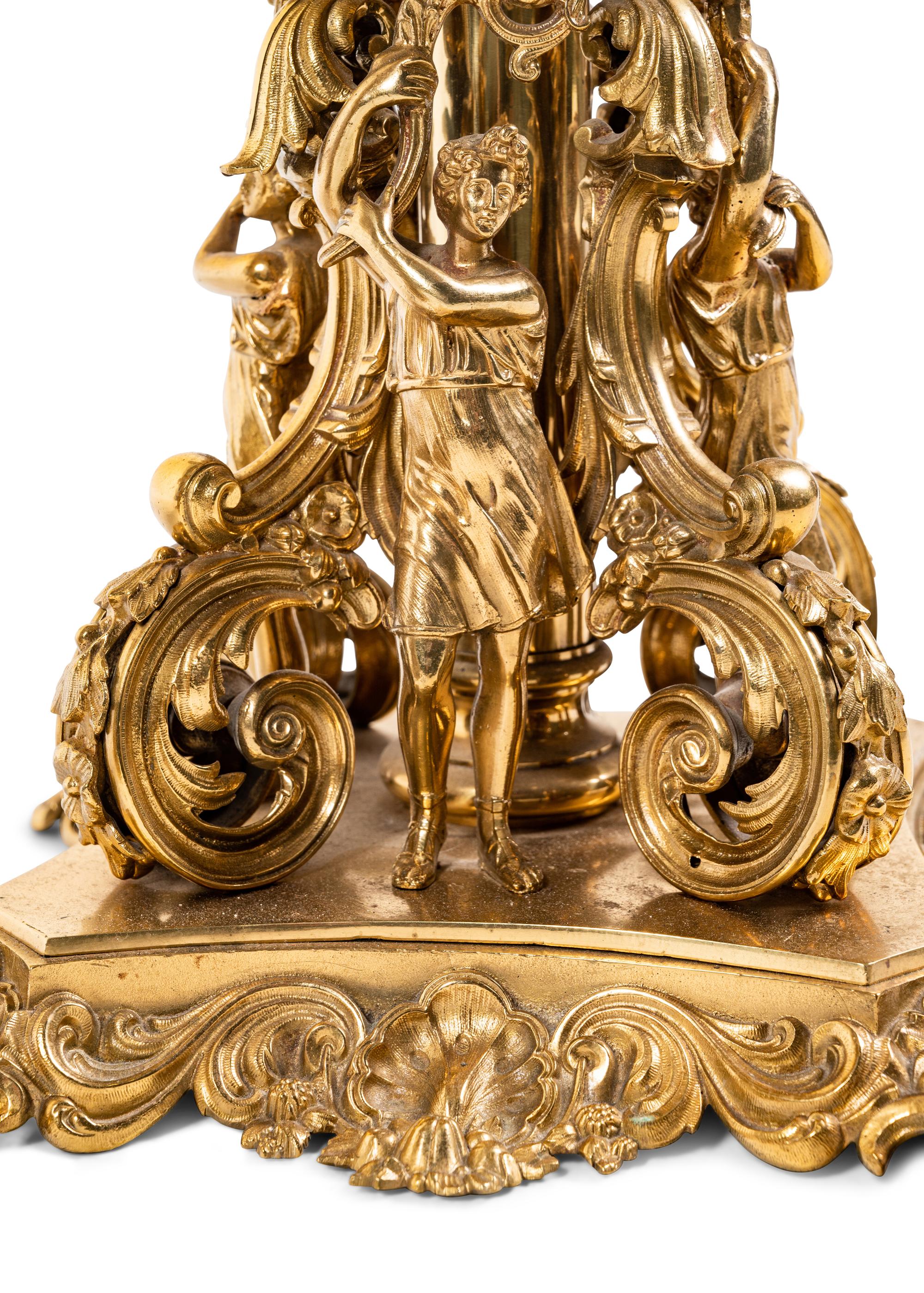 A Pair of Continental Gilt Metal Sixteen-Light Candelabra