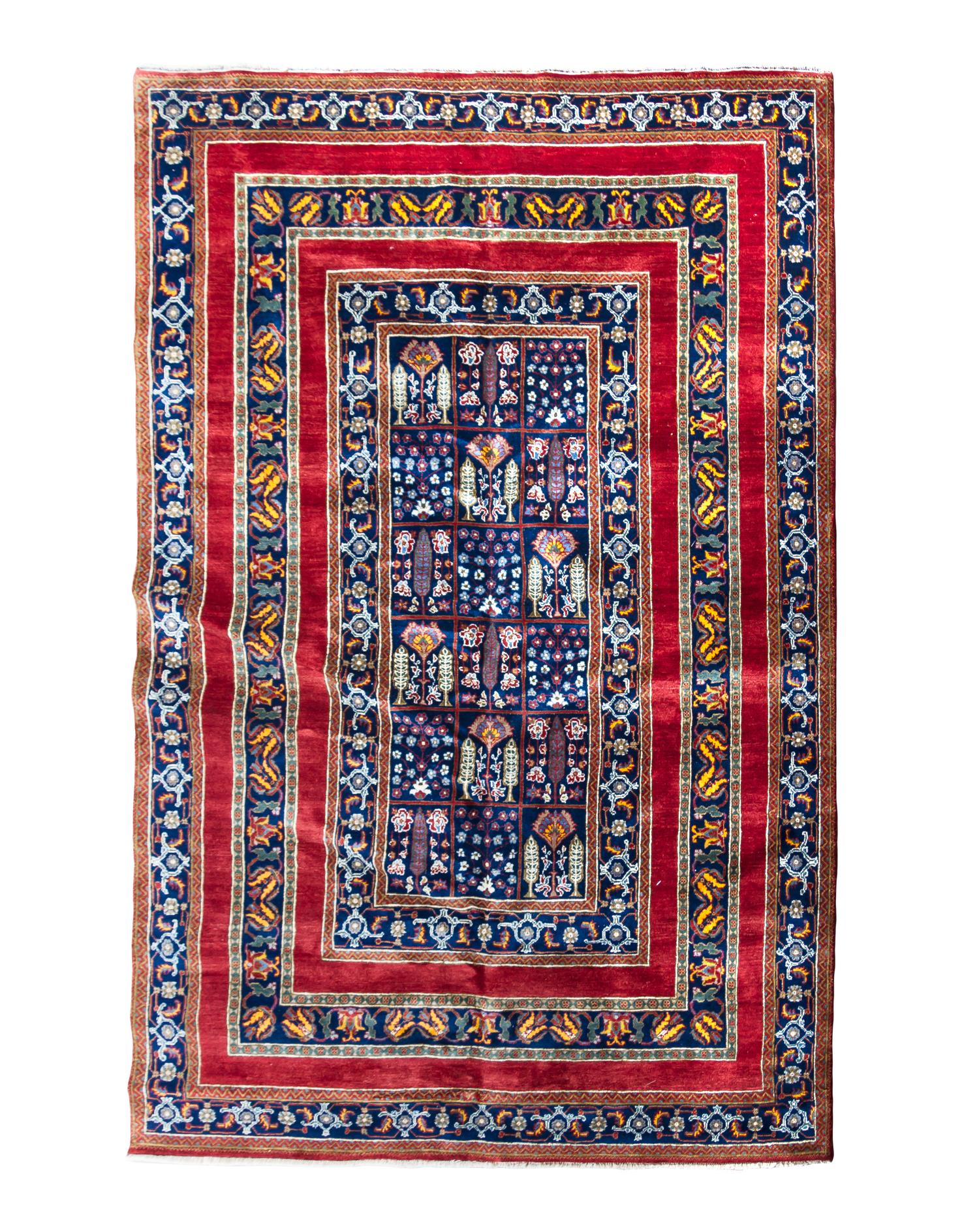 A Persian Wool Rug 9 feet 2 inches x 5 feet 11 inches.