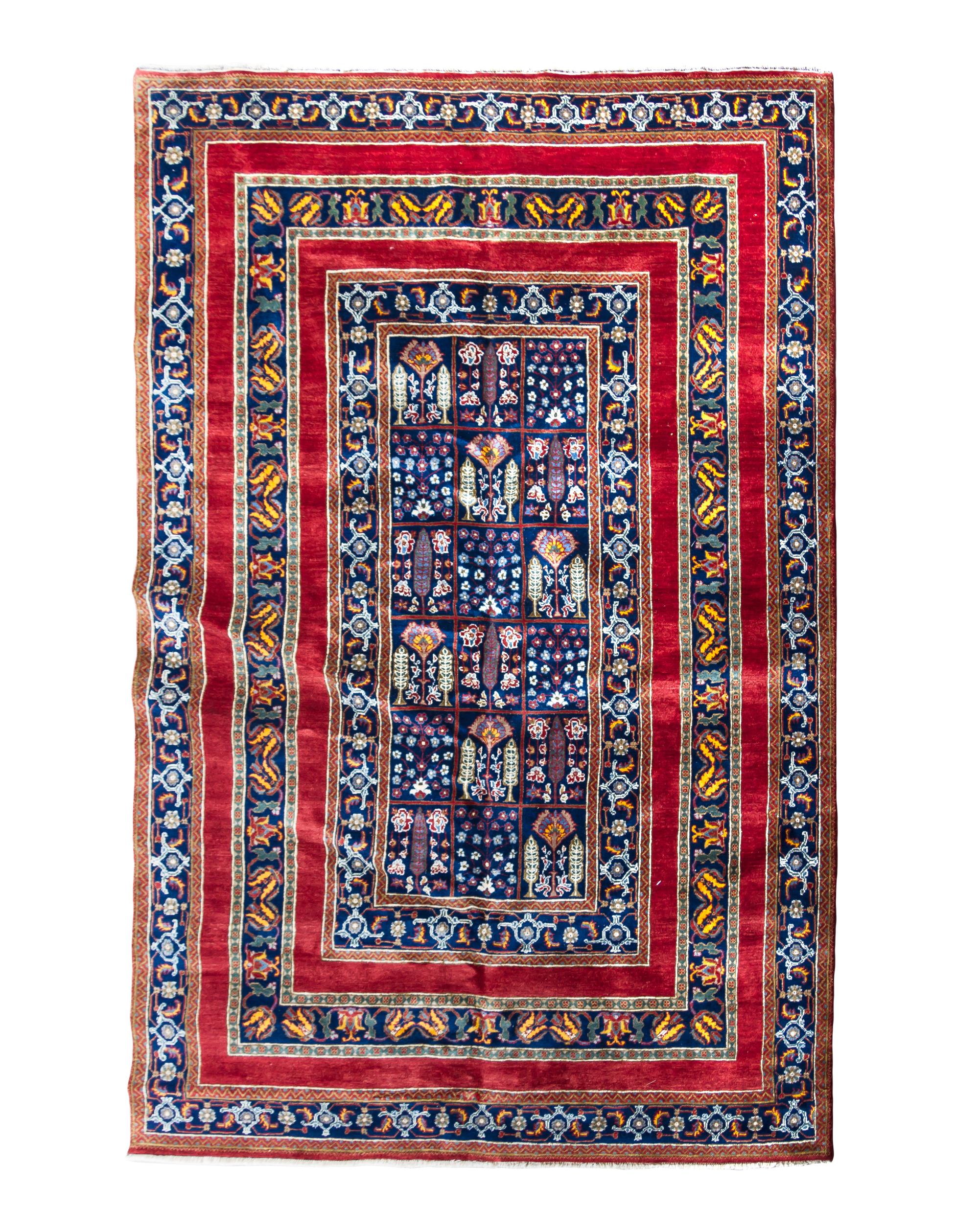 A Persian Wool Rug 9 feet 2 inches x 5 feet 11 inches.