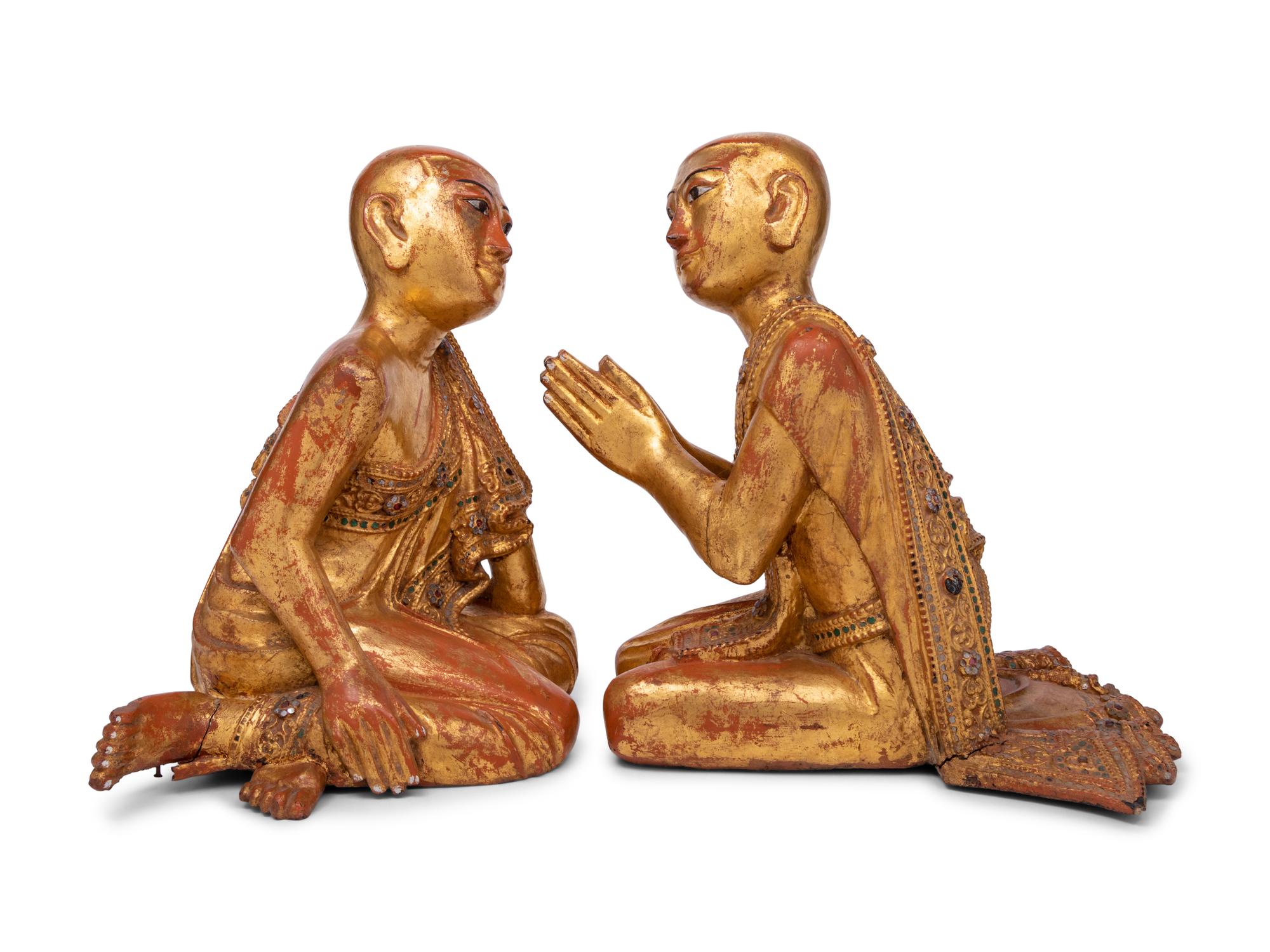 A Pair of Southeast Asian Giltwood Monk Figures