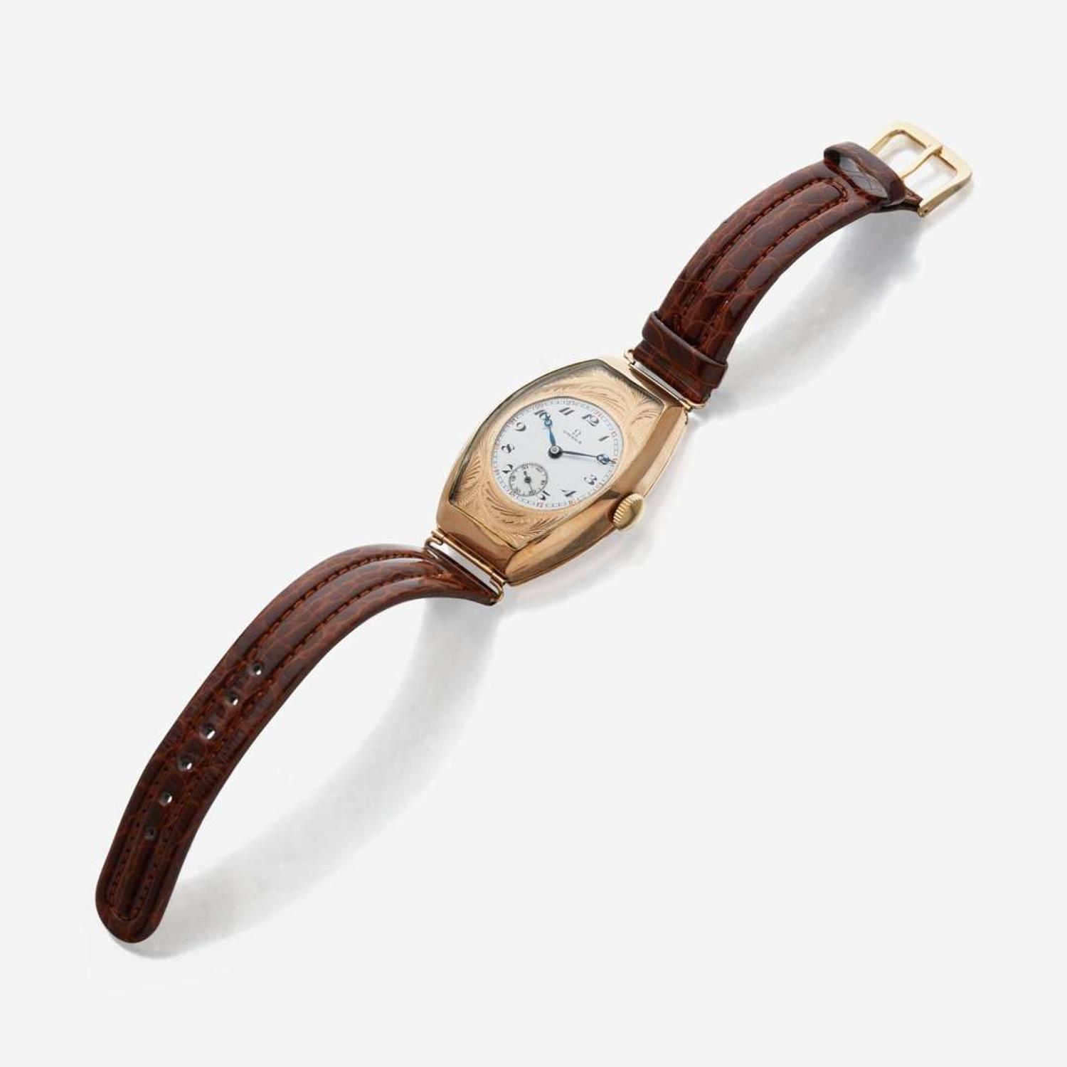A rose gold drivers watch, Omega C. 1910