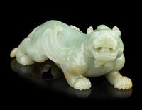 A Chinese Celadon Jade Figure of a Mythical Beast