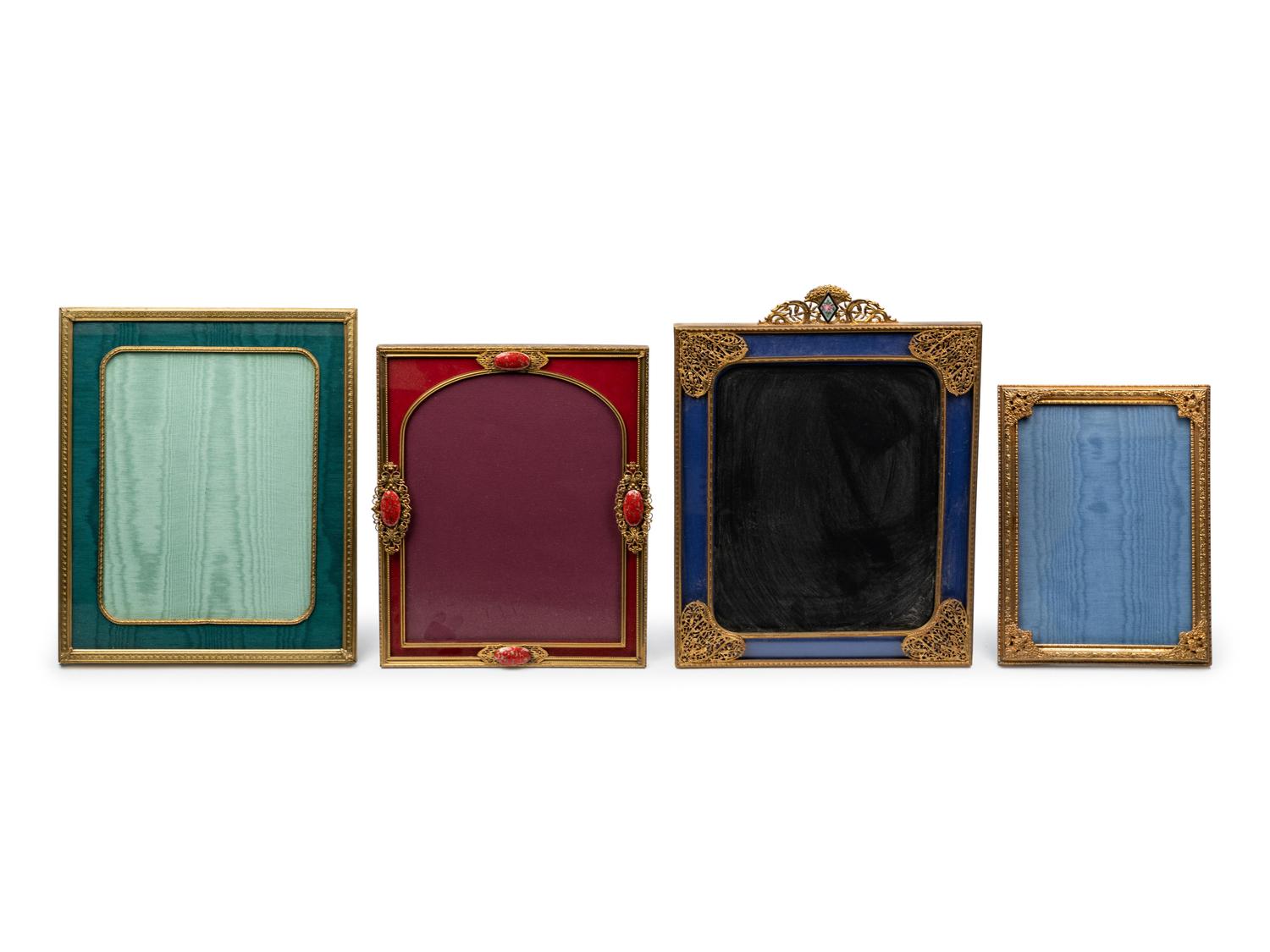 Four Gilt Metal Frames