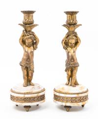 A Pair of French Gilt Bronze and Marble Figural Candlesticks Height 10 3/4 inches.