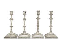 An Assembled Set of George III Sterling Silver Candlesticks