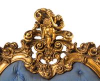 An Italian Rococo Style Giltwood Bed