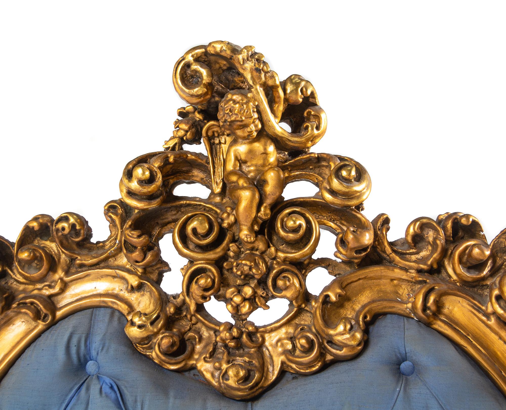An Italian Rococo Style Giltwood Bed
