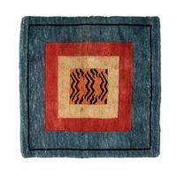 A Tibetan Silk Patchwork Offering Cloth and A Tibetan Rug