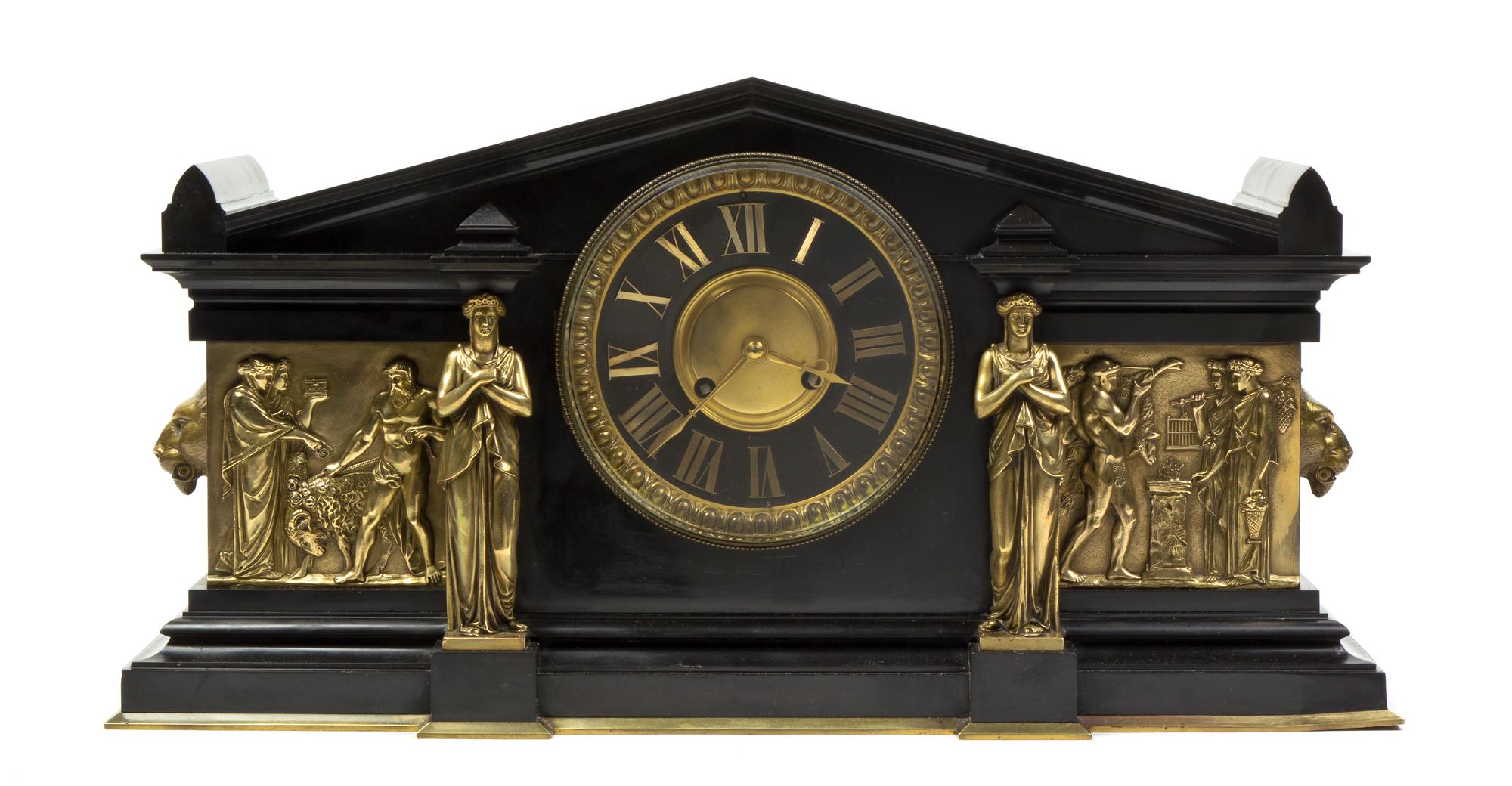 A French Neoclassical Slate and Gilt Metal Mounted Mantel Clock, Width 21 inches.