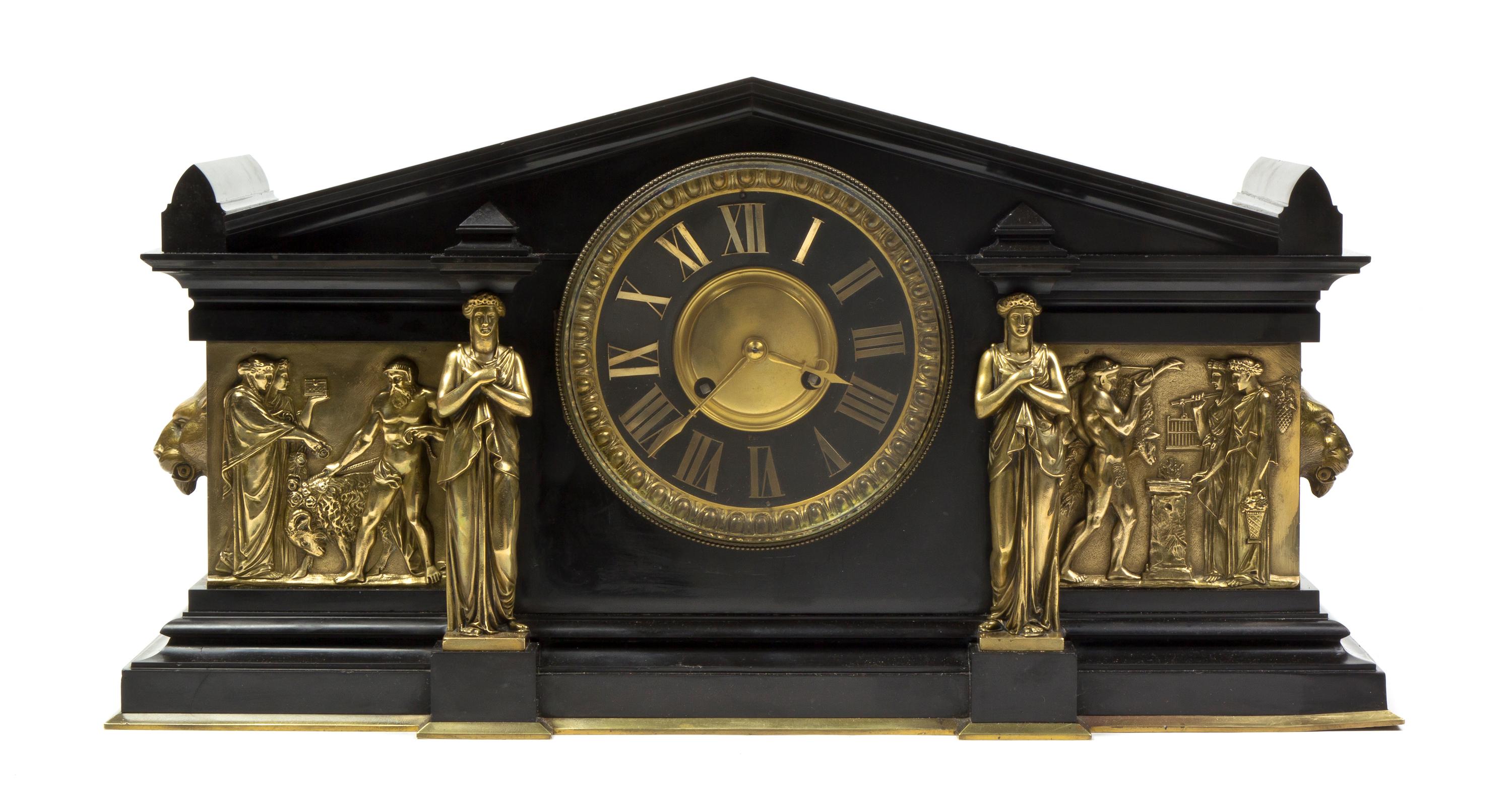 A French Neoclassical Slate and Gilt Metal Mounted Mantel Clock, Width 21 inches.