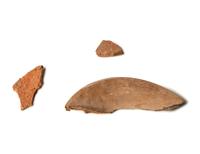 A Group of 19 Holy Land Terracotta Oil Lamps, Pottery, and Bronze Blades