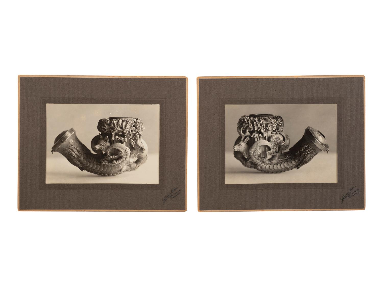 [AMERICANA - PIPES]. 2 ornately carved meerschaum pipes, each featuring animal motifs.