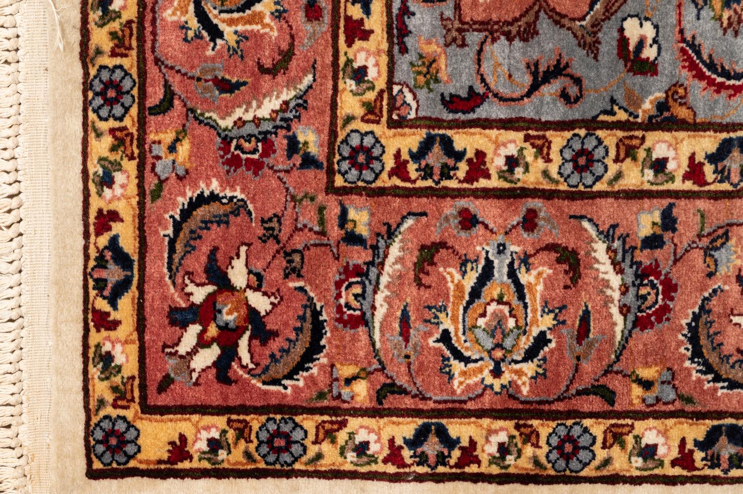A Tabriz Wool Rug