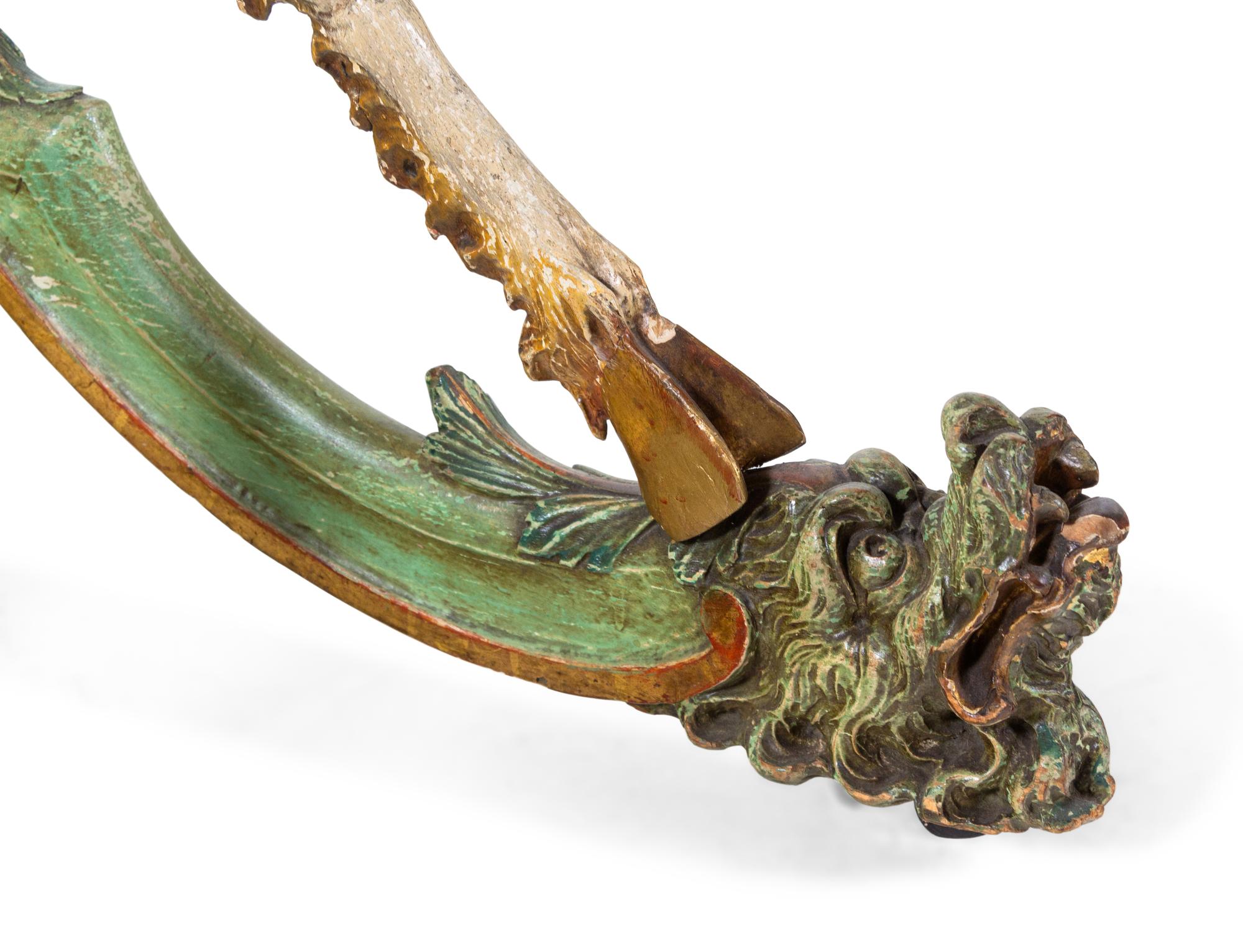 A Venetian Figural Carved and Polychrome Decorated Wood Cradle