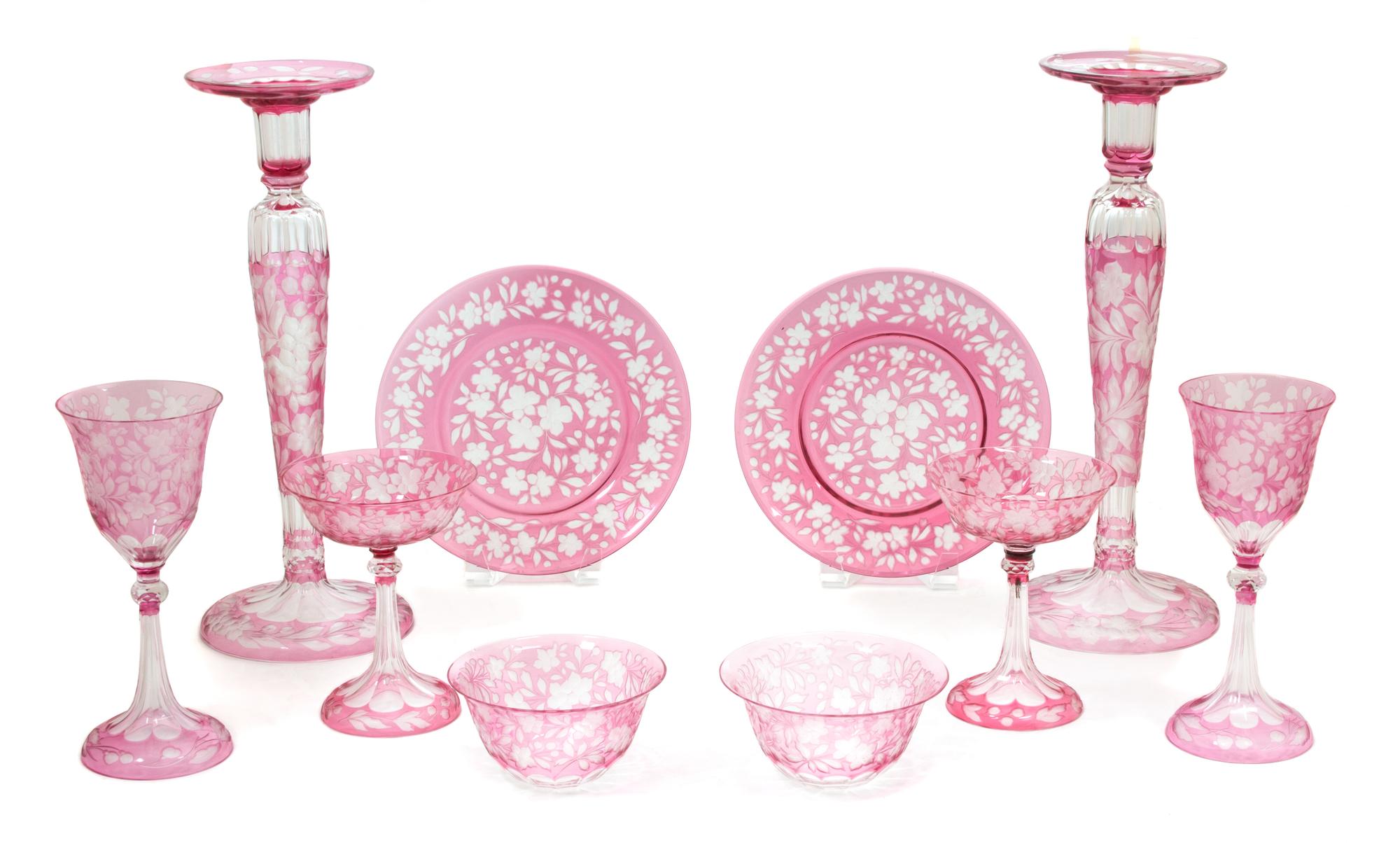 A Collection of Cranberry Cut-to-Clear Glass Height of tallest 14 1/4 inches. — 20TH CENTURY