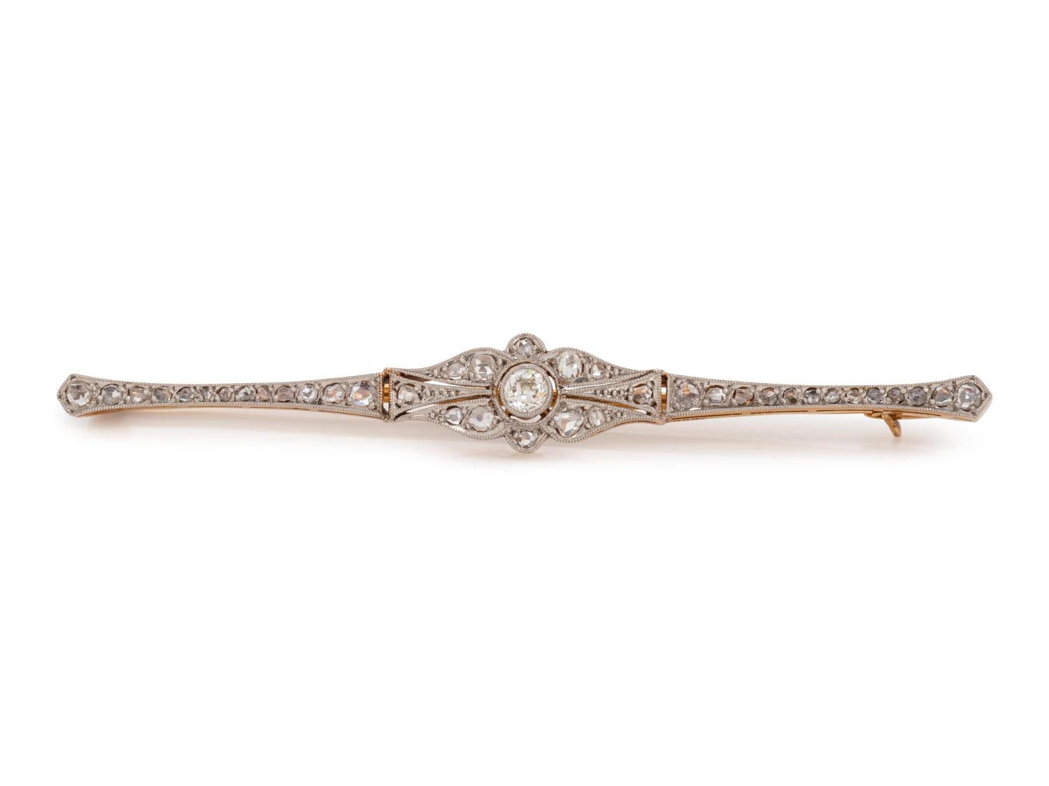 An Edwardian Platinum Topped 18 Karat Yellow Gold and Diamond Bar Brooch,