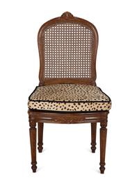 A Set of Four Regency Style Mahogany Cane Seat Dining Chairs