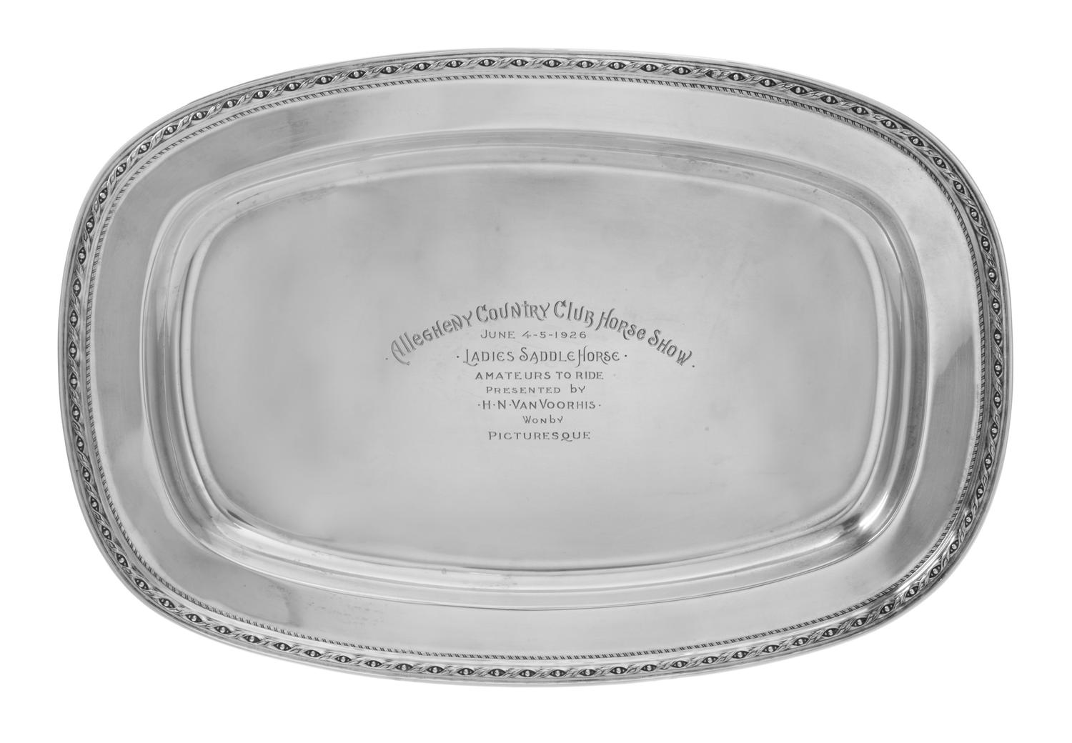 An American Silver Presentation Tray, Reed & Barton, Taunton, MA, of rectangular form with bowed sides, having a foliate and braided ri