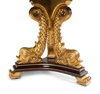A Karges Regency Style Dolphin Base Table