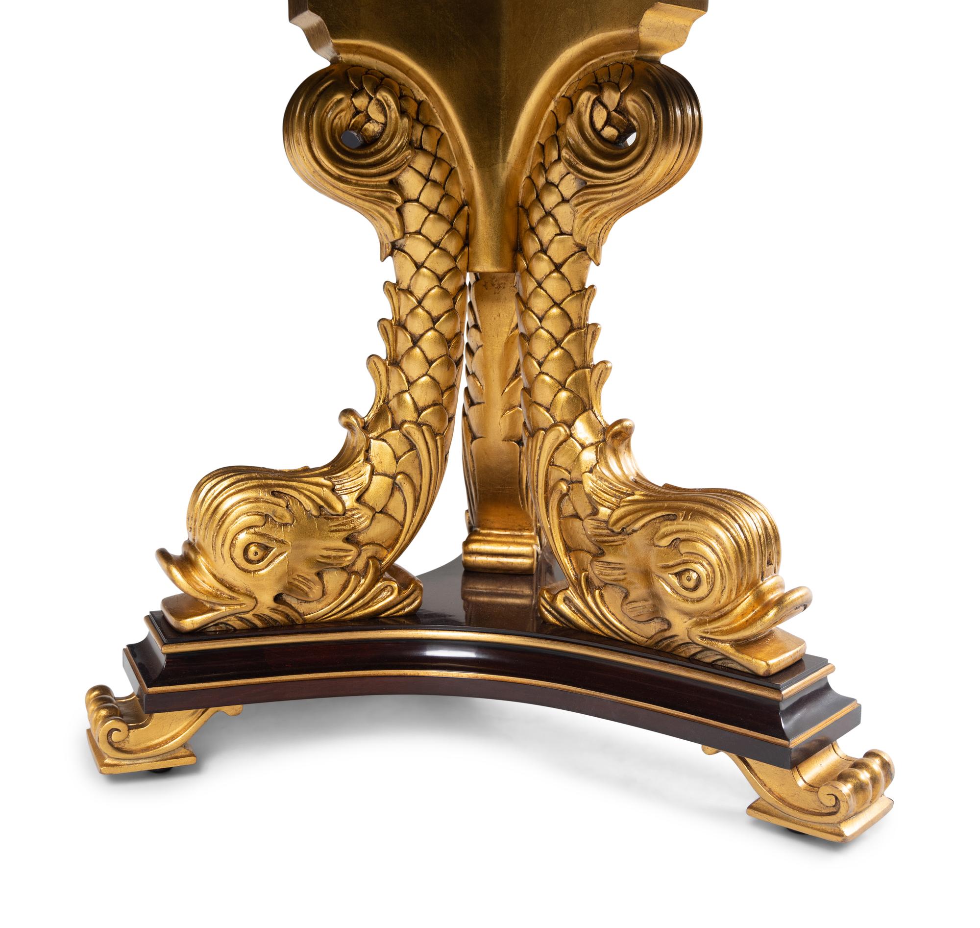 A Karges Regency Style Dolphin Base Table