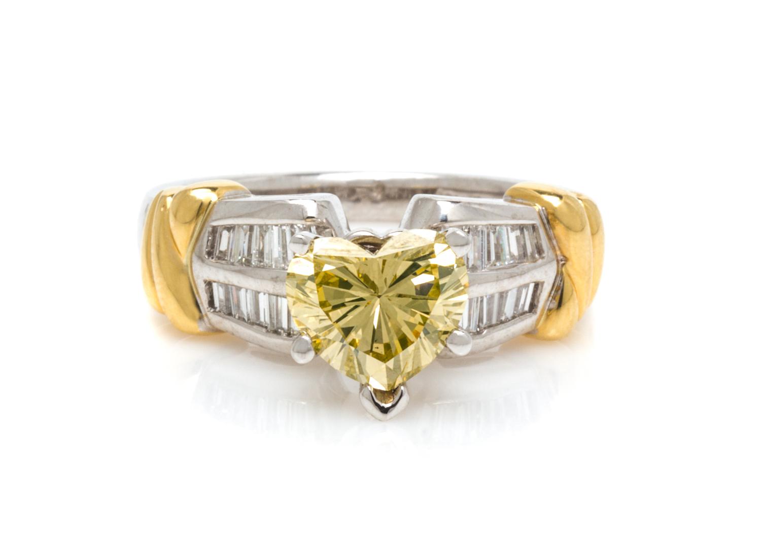 A Platinum, 18 Karat Yellow Gold, Colored Diamond and Diamond Ring, 6.30 dwts.
