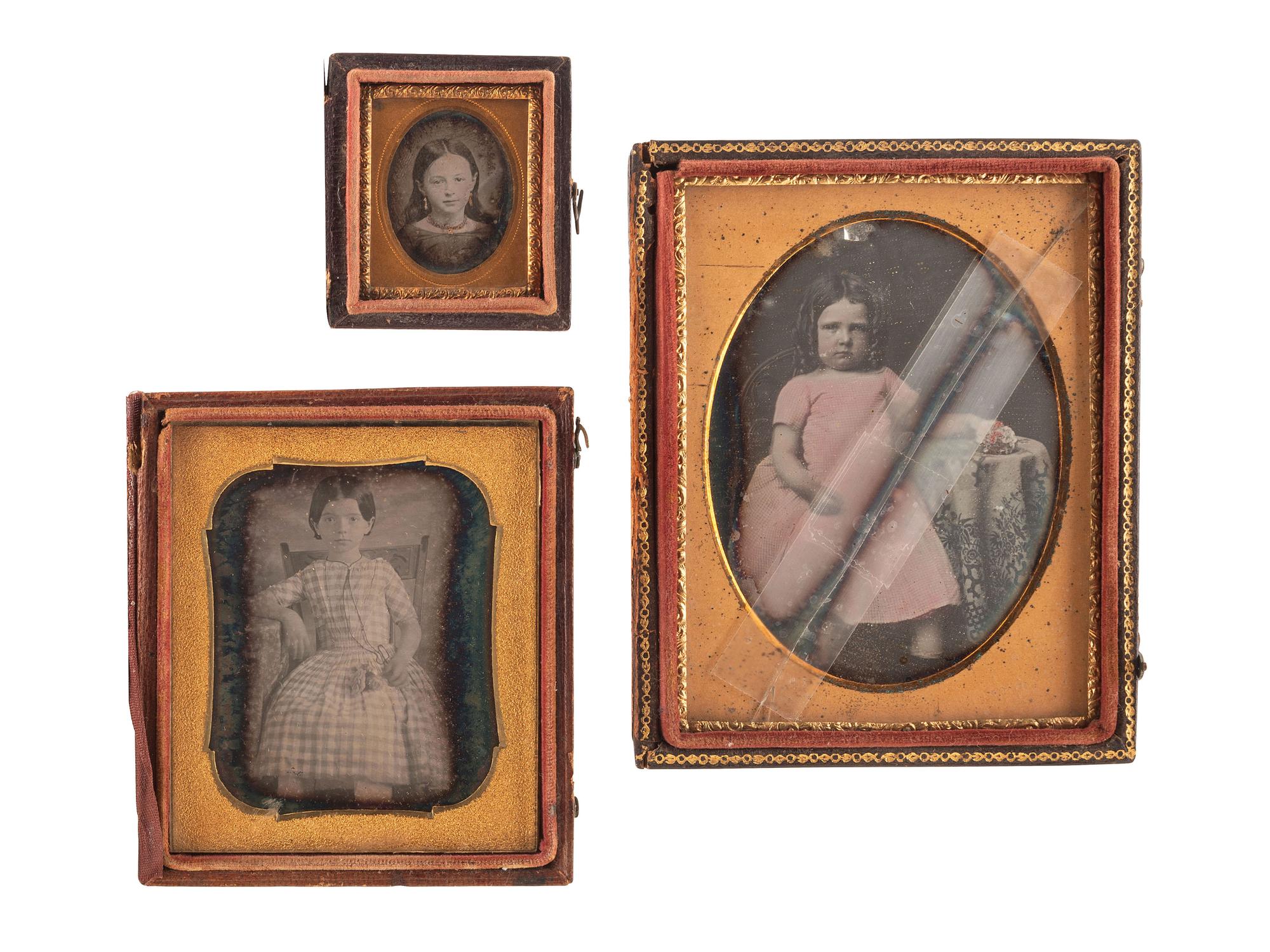 [EARLY PHOTOGRAPHY]. A group of 22 daguerreotype portraits of female children, including: