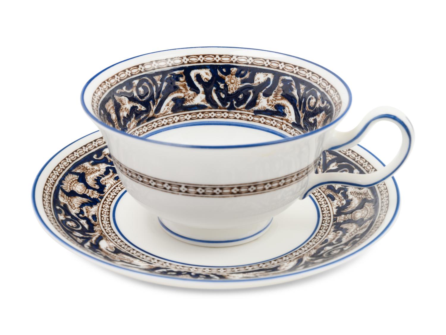 A Wedgwood Florentine Porcelain Partial Dinner Service